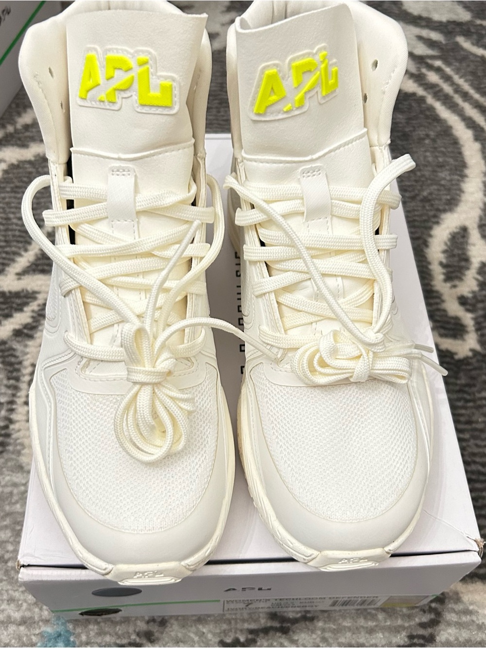APL Women’s Techloom Defender High-Top Sneakers in Cream with Neon Yellow Logo